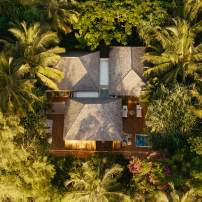 Luxurious villa surrounded by lush tropical greenery in Tanzania.